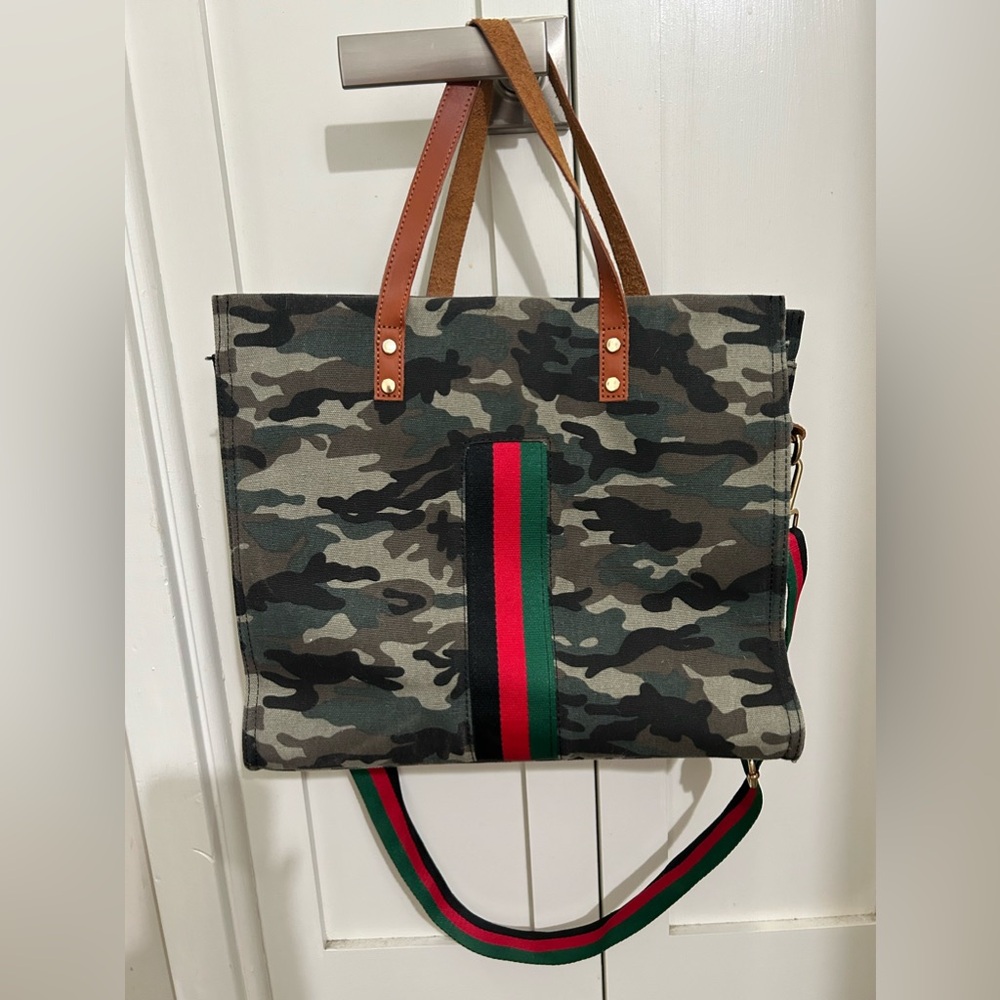 Camo print canvas tote with accent stripe and crossbody strap